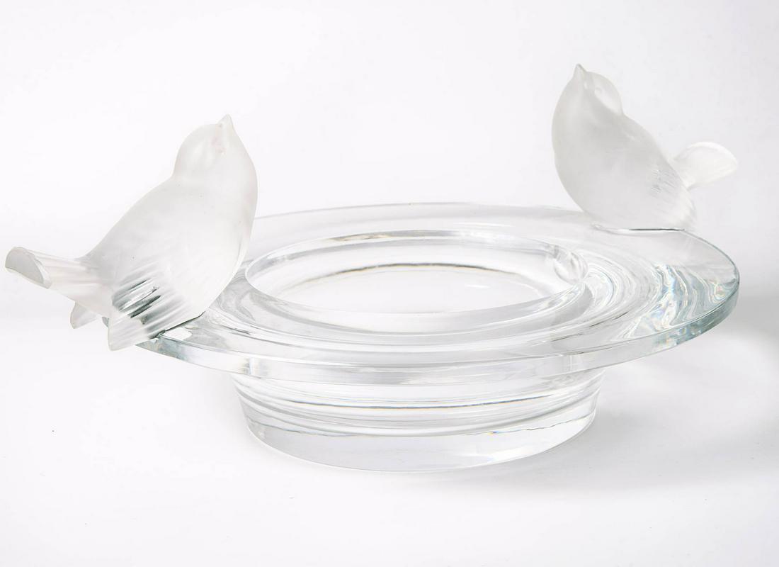 A Very Large Lalique Crystal Centerpiece: A Very Large Lalique Crystal Centerpiece Designed as a deep polished bowl with two opaque glass birds on both sides. Signed. Width: 40 cm