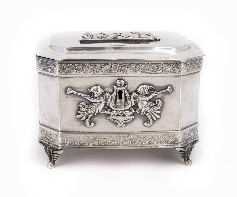 A Fine Silver Jewelry Casket by J. Plewinski, Poland,: A Fine Silver Jewelry Casket by J. Plewinski, Poland, Late 19th Century The polygonal body decorated with a top and bottom rim of hammered and embossed scrolling vines and resting on four cabriole sup