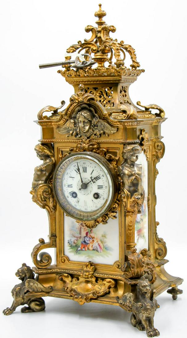 An Impressive Sevre Style Bronze Gilt and Porcelain: An Impressive Sevre Style Bronze Gilt and Porcelain Mantle Clock, France, Mid 19th Century Height: 51 cm Condition: For a detailed condition report, please contact us at info@hammersite.com
