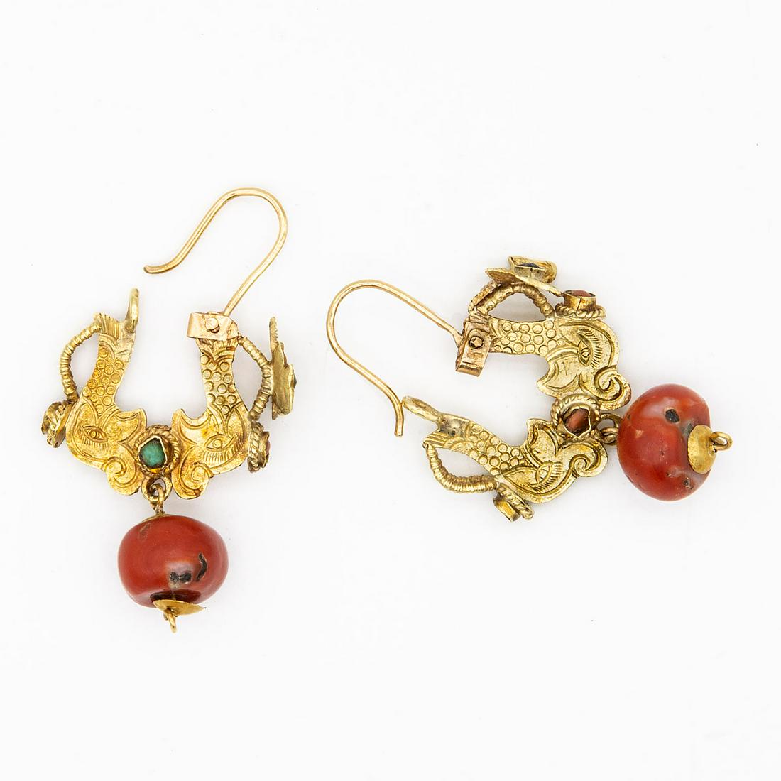 A Pair of Antique 18K Gold Afghan Earrings Inlaid with: A Pair of Antique 18K Gold Afghan Earrings Inlaid with Corals Total weight: 11.2 gr; length: 4.8 cm Condition: For a detailed condition report, please contact us at info@hammersite.com