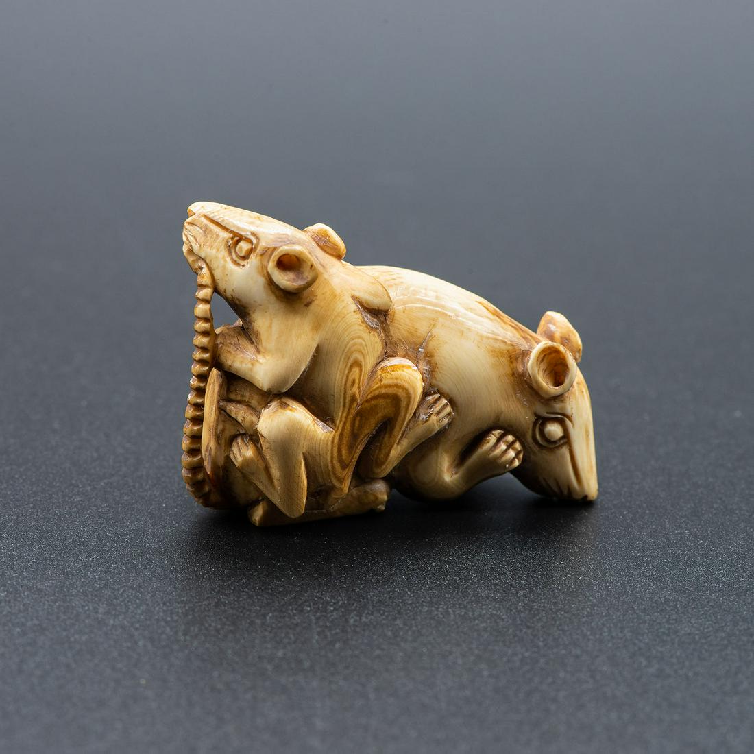 A Carved Netsuke of a Pair of Rats, Japan, Meiji: A Carved Netsuke of a Pair of Rats, Japan, Meiji Period, Late 19th-Early 20th Century Height: 4 cmCondition: For a detailed condition report, please contact us at info@hammersite.com