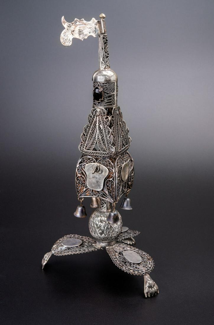 A Fine Silver Spice Tower, Austro-Hungary, 19th Century: A Fine Silver Spice Tower, Austro-Hungary, 19th Century The base designed as three spread out petals of filigree, beneath paw like supports. Above an orb shaped stem embossed with an an acorn pattern.