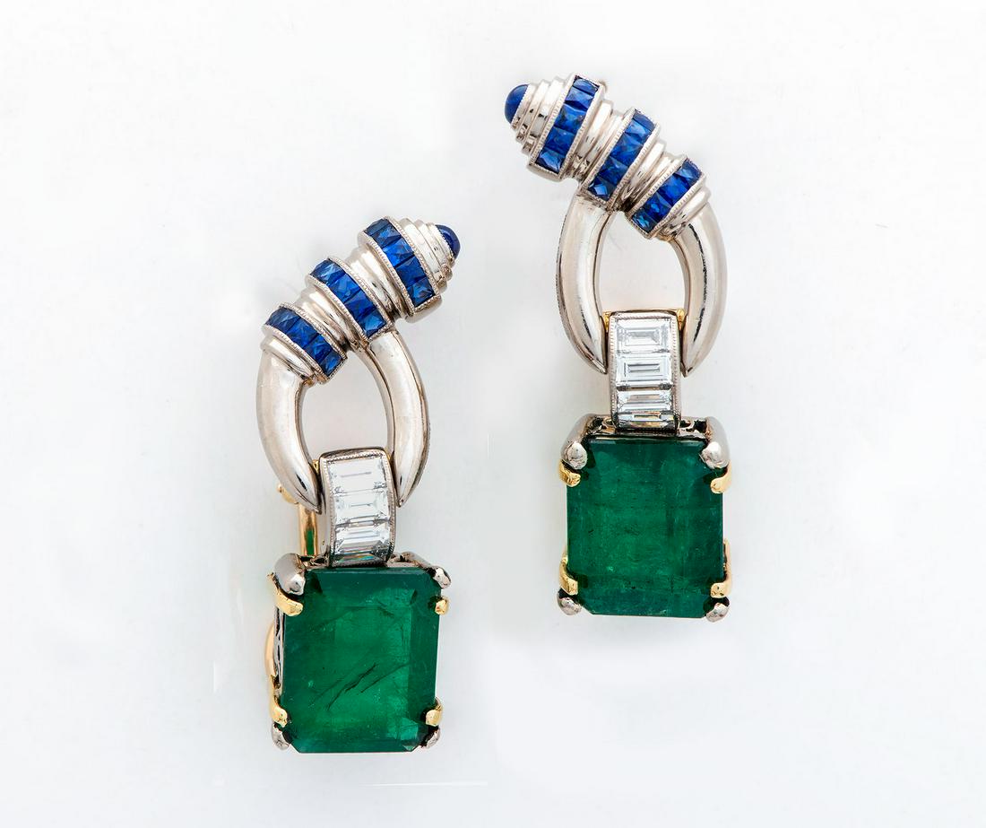 A Pair of Fine David Webb Two Tone-Gold Diamond Emerald: A Pair of Fine David Webb Two Tone-Gold Diamond Emerald and Sapphire Earrings Designed as an emerald-cut emerald (approx. 4Ct in each earring) set in a two-tone gold frame and surmounted by a demi-lun