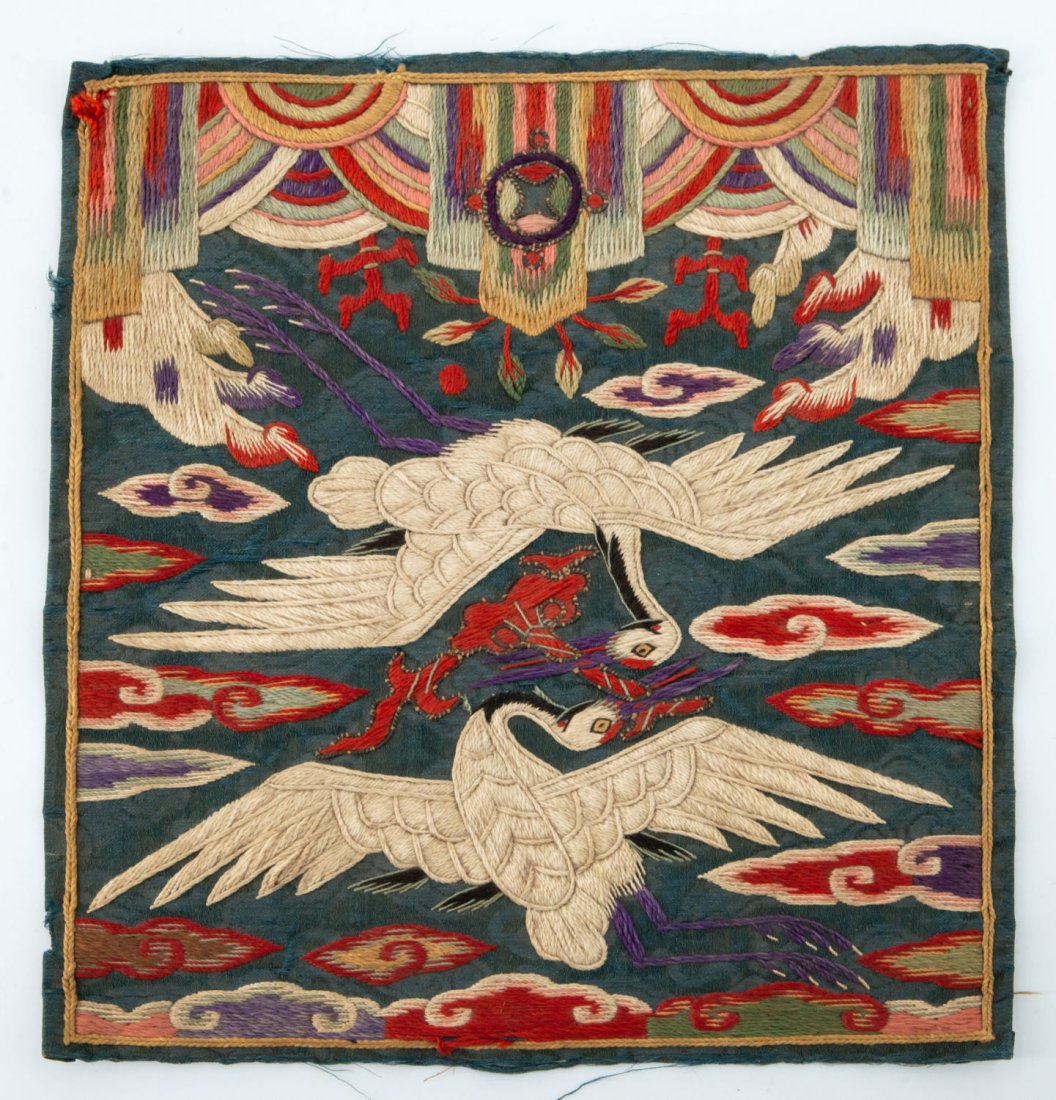 An Embroidered Rank Badge with Double Cranes, Korea, Joseon Dynasty (1392-1910): An Embroidered Rank Badge with Double Cranes, Korea, Joseon Dynasty (1392-1910)Silk, metallic thread. First to third rank civil official.14.5 x 17 cmNote: For a very close example see: Young Yang Embr