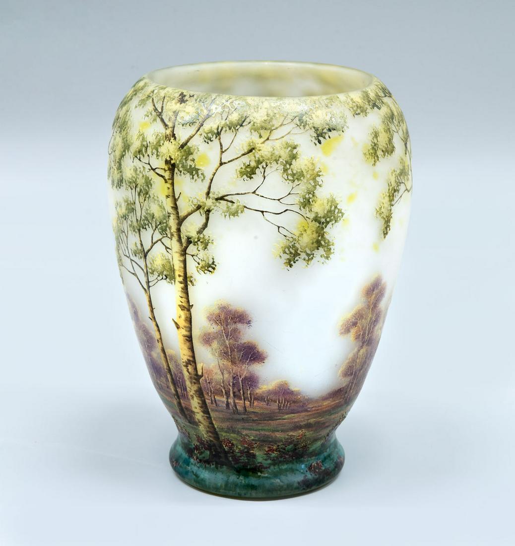 A Daum Nancy Cameo and Etched Glass Vase, France, 1900-1914: A Daum Nancy Cameo and Etched Glass Vase, France, 1900-1914 Ovoid body set on a circular base with a tapered rim. Decorated with a cameo depiction of birch trees over a pale blue etched ground. Signed