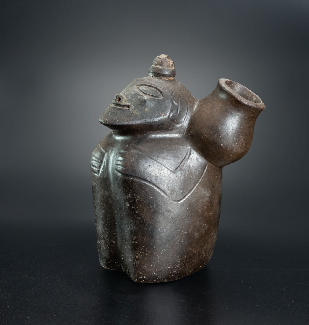An Anthropomorphic Effigy Jar, Chavin, Peru, 1200-200 BCE: An Anthropomorphic Effigy Jar, Chavin, Peru, 1200-200 BCE Height: 16.8 cm Provenance: Jean Pierre Cottier and Fiorella Cottier-Angeli, Geneva, Switzerland. Purchased by Yossef Maiman between 2000-2008