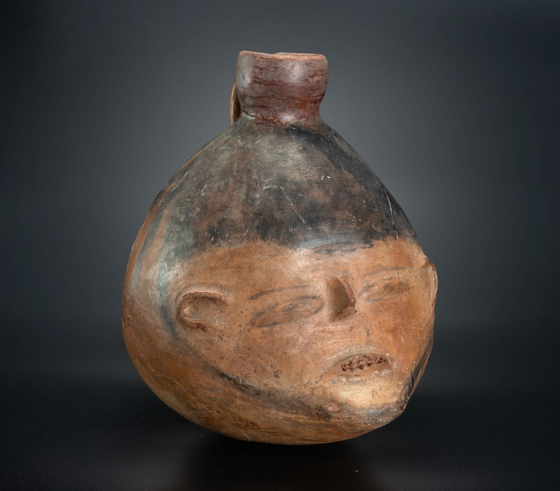 A Trophy Head Effigy Jar, Vicus, Peru, 500-300 BCE (1 of 3)