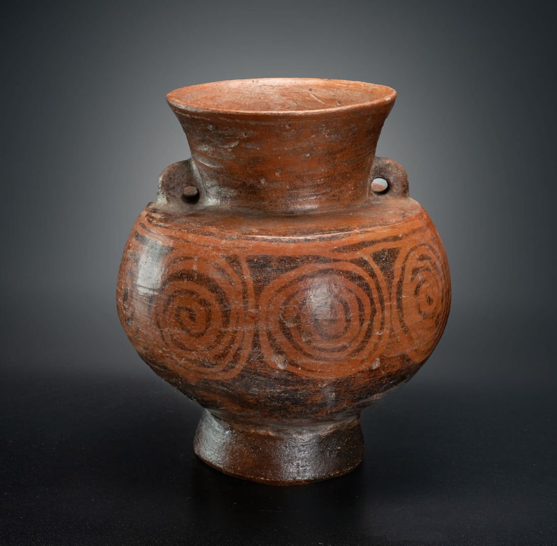 A Wide Spout-and-Double Handle Jar on Pedestal with Painted Geometric Decoration, Viru, Peru, 200: A Wide Spout-and-Double Handle Jar on Pedestal with Painted Geometric Decoration, Viru, Peru, 200 BCE-400 CE Height: 16.7 cm For more details on this lot refer to the following number in the link: num