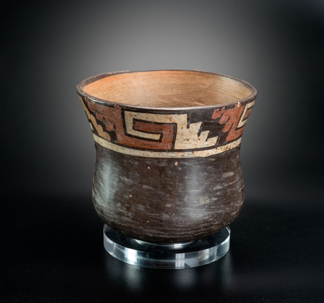A Bowl in the Form of a Lyre with Interlocking Step-Volute Motif, Early Nasca, Peru, 1-200 CE: A Bowl in the Form of a Lyre with Interlocking Step-Volute Motif, Early Nasca, Peru, 1-200 CE Height: 12.1 cm For more details on this lot refer to the following number in the link: num 146, p. 155 (