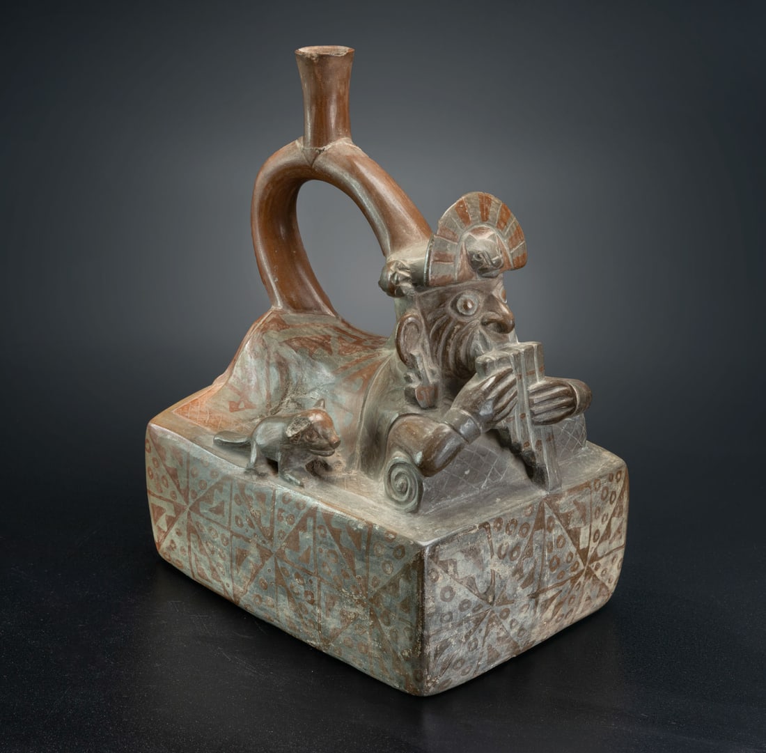 A Stirrup-Spout Effigy Bottle: A Deity Playing Panpipe, Early Moche, Peru, 100-450 CE (1 of 5)