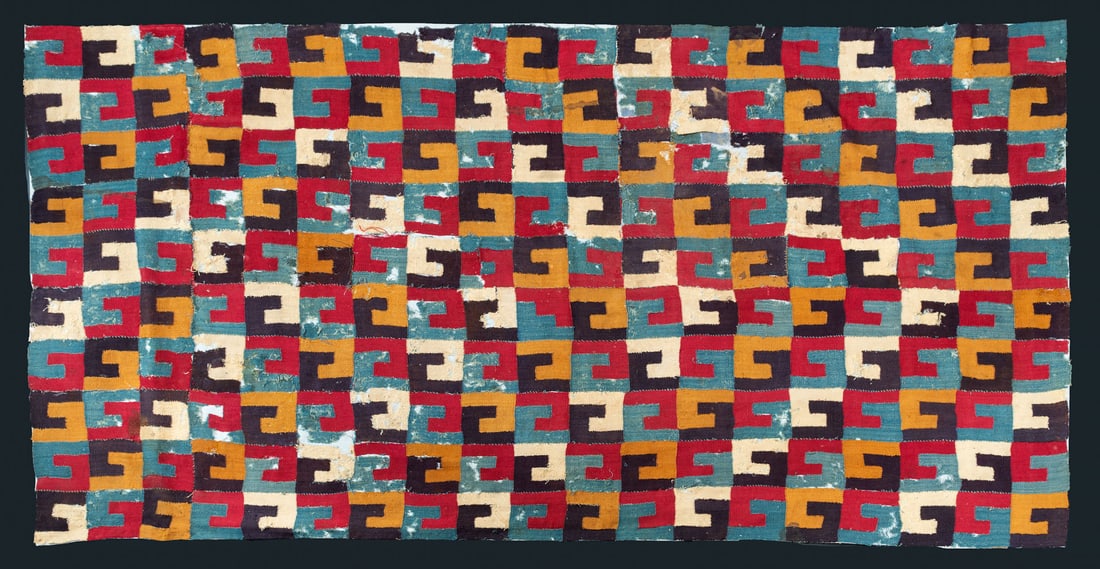 An Incomplete Mantle with Interlocking L Motif, Central-South/South Coast, Middle Horizon, 600-1000: An Incomplete Mantle with Interlocking L Motif, Central-South/South Coast, Middle Horizon, 600-1000 CE Geometric-Huari Local Style Multicolored camelid fiber plain weave with discontinuous warps and w
