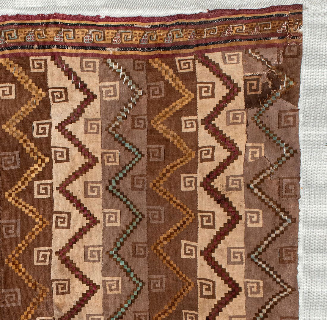 Part of a Stripped Mantle with Zigzag and Volute Motifs, North/Central Coast, Peru, Early Late (1 of 2)