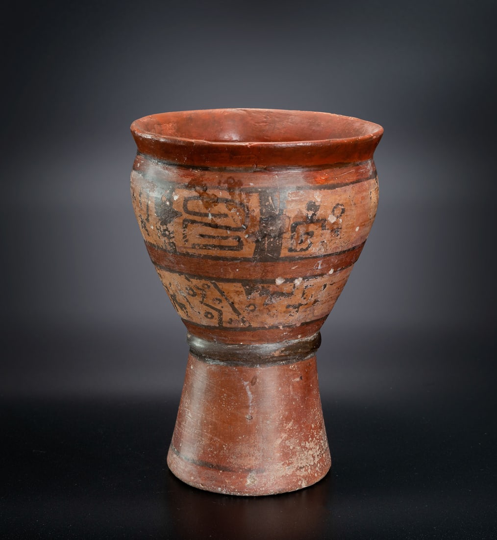 A Beaker Beaker with Painted Geometric Motif, Tiahuanaco, Bolivia, 200-1000 CE: A Beaker Beaker with Painted Geometric Motif, Tiahuanaco, Bolivia, 200-1000 CE Height: 16.5 cm Provenance: Kemper Collection, Switzerland. Donated to "The Museum of Islamic Art", Jerusalem, 