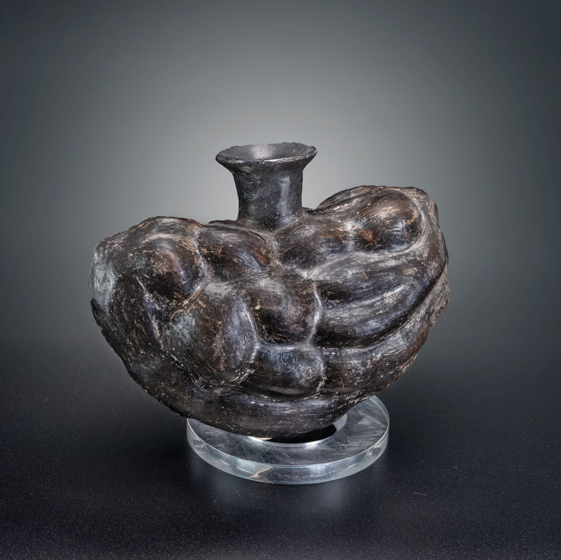 A Yacon Root Effigy Bottle with Flaring Spout, Chimu, Peru, 900-1534 CE: A Yacon Root Effigy Bottle with Flaring Spout, Chimu, Peru, 900-1534 CE Height: 13.9 cm For more details on this lot refer to the following number in the link: num 209, p. 162 (