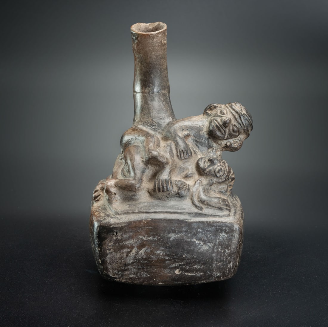 A Stirrup-Spout Bottle: Erotic Scene, Chimu, Peru, 900-1534 CE: A Stirrup-Spout Bottle: Erotic Scene, Chimu, Peru, 900-1534 CE Height: 16.7 cm For more details on this lot refer to the following number in the link: num 217, p. 163 (