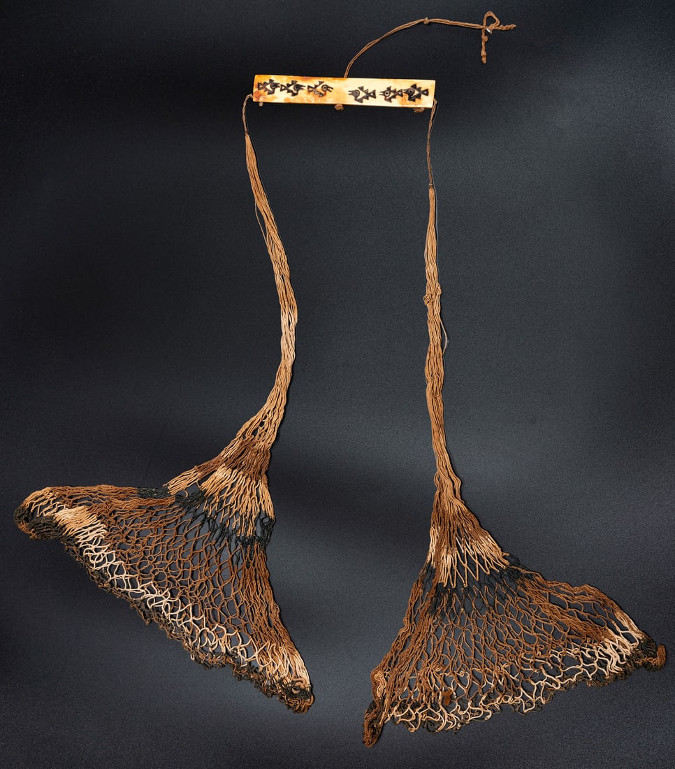 Scale in Cotton Net with Beam of Bone, North/Central Coast, Peru, Late Intermediate Period, 900-1530: Scale in Cotton Net with Beam of Bone, North/Central Coast, Peru, Late Intermediate Period, 900-1530 CE Possibly Chimu Cotton knotted netting. Length: 61 cm For mo