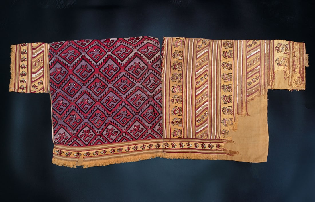 A Shirt with Sleeves, Partly in Red and Purple, Central Coast, Late Intermediate Period, 1100-1470: A Shirt with Sleeves, Partly in Red and Purple, Central Coast, Late Intermediate Period, 1100-1470 CE Local Style, North Coast Influence Multicolored cotton and camelid fiber in slit tapestry with ste