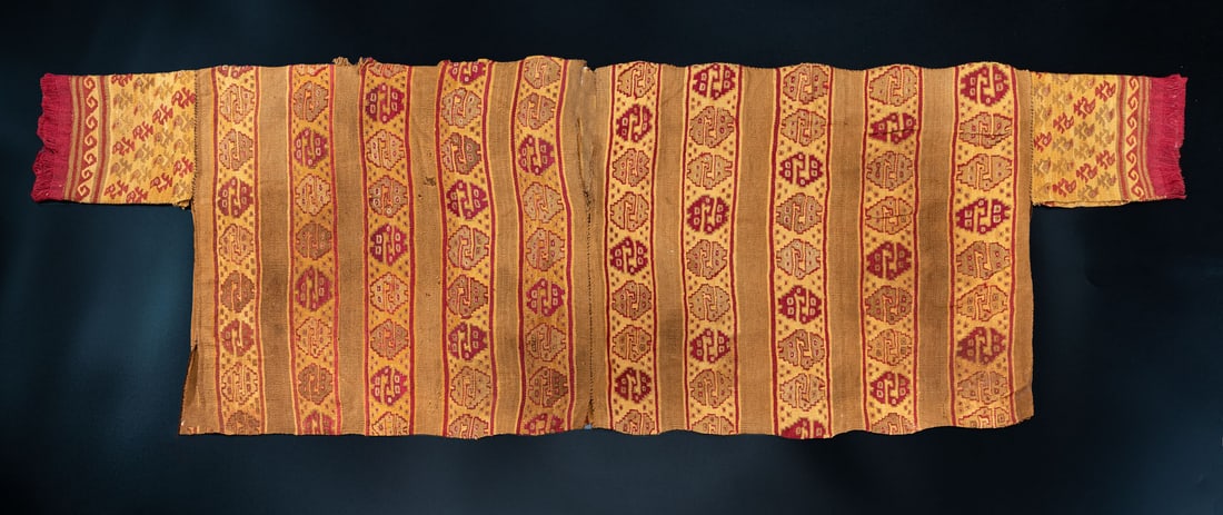 Six Tapestry Panels Mounted as a Sleeved Shirt, Central Coast, Late Intermediate Period, 1100-1470: Six Tapestry Panels Mounted as a Sleeved Shirt, Central Coast, Late Intermediate Period, 1100-1470 CE Local Style Cotton and multicolored camelid fiber slit tapestry, stem stitch as covering. 40 x 125