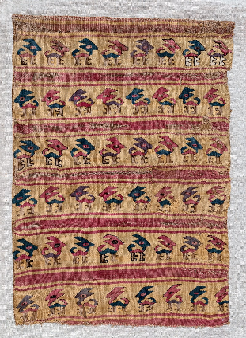 A Textile Panel Decorated with Multicolored Animals, Central Coast, Peru, Late Intermediate Period,: A Textile Panel Decorated with Multicolored Animals, Central Coast, Peru, Late Intermediate Period, 1100-1470 CE Local Style Multicolored camelid fiber in slit tapestry. 45 x 32 cm <