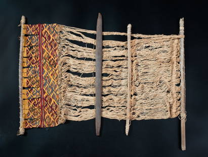 A Back-Strap Loom, Central Coast, Peru, Late Intermediate Period, 1100-1470 CE: A Back-Strap Loom, Central Coast, Peru, Late Intermediate Period, 1100-1470 CE Local Style Cotton and multicolored camelid fiber in slit tapestry with eccentric wefts. 67 x 48 cm