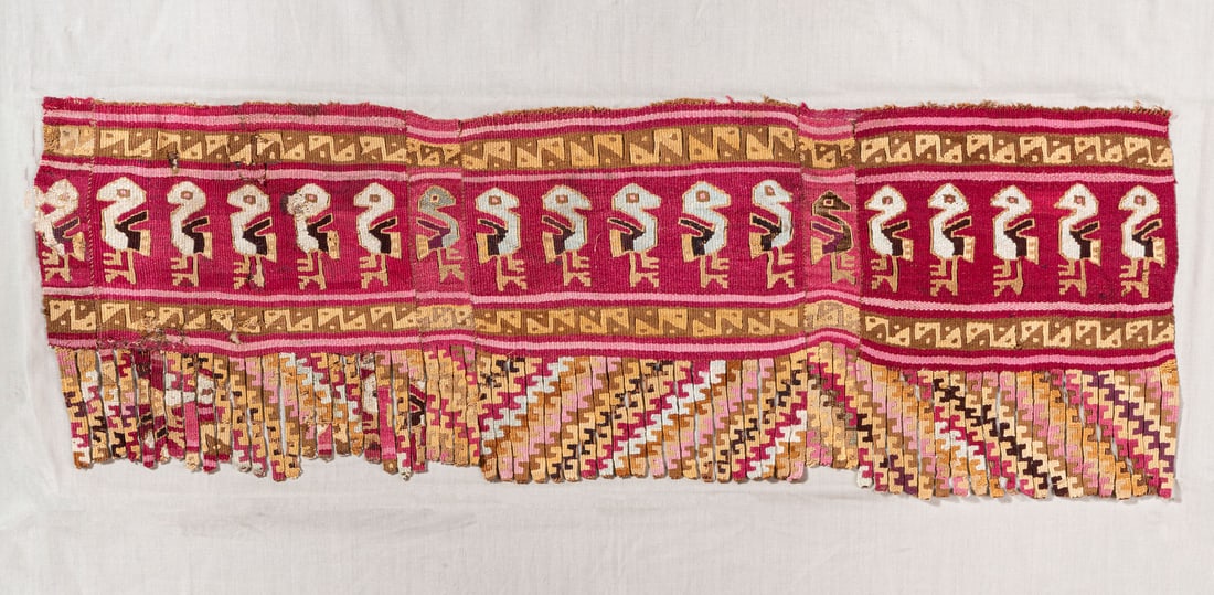 Part of a Decorative Border with Birds, Central Coast, Peru, Late Intermediate Period, 1100-1470 CE: Part of a Decorative Border with Birds, Central Coast, Peru, Late Intermediate Period, 1100-1470 CE Local Style Brown Cotton and multicolored camelid fiber slit tapestry, open slits. 23 x 66 cm<