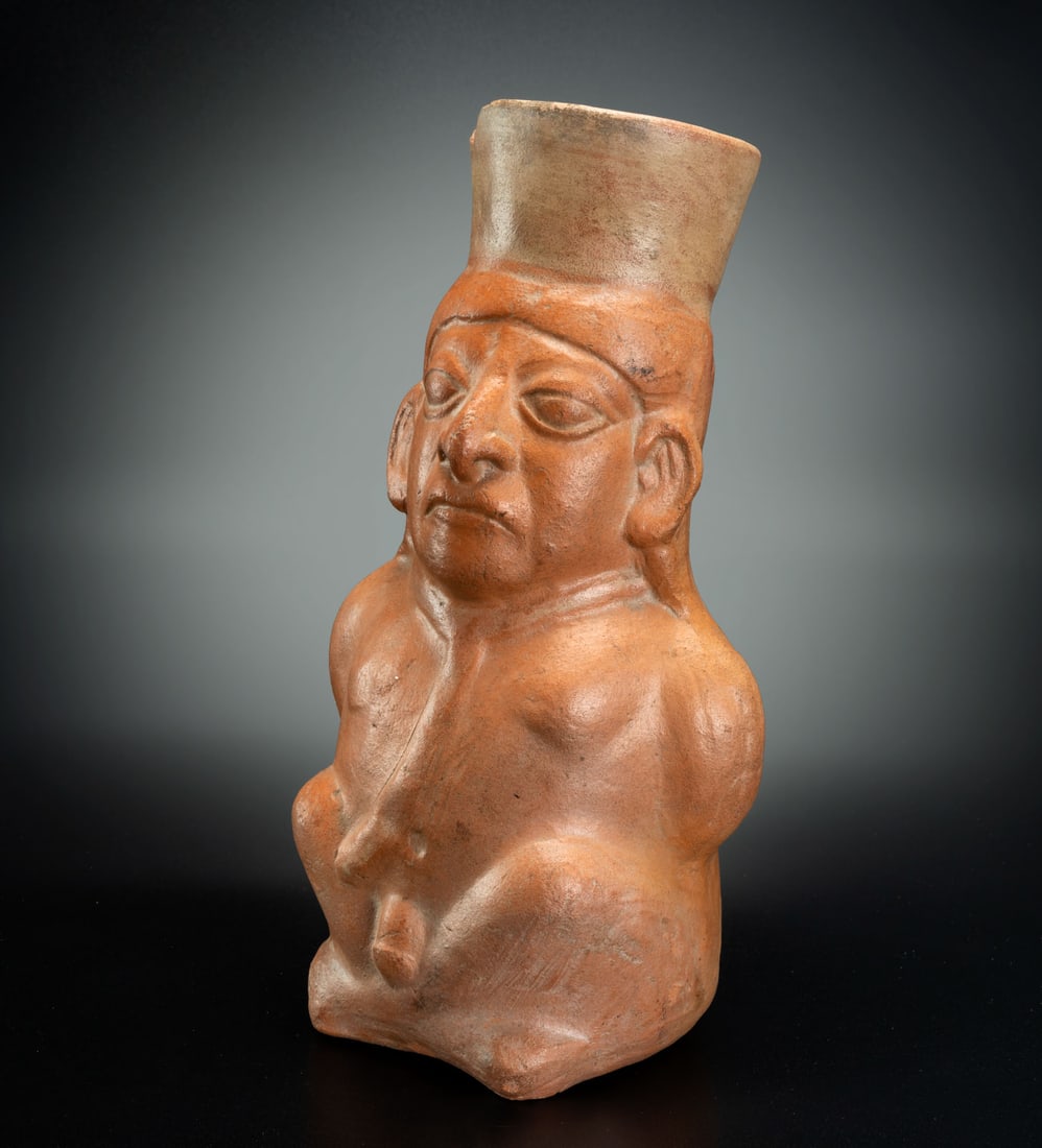 An Effigy Jar: Prisoner, Moche, Peru, 200-500 CE: An Effigy Jar: Prisoner, Moche, Peru, 200-500 CE Height: 29 cm Provenance: Kemper Collection, Switzerland. Donated to "The Museum of Islamic Art", Jerusalem, during 1970's. Purchased