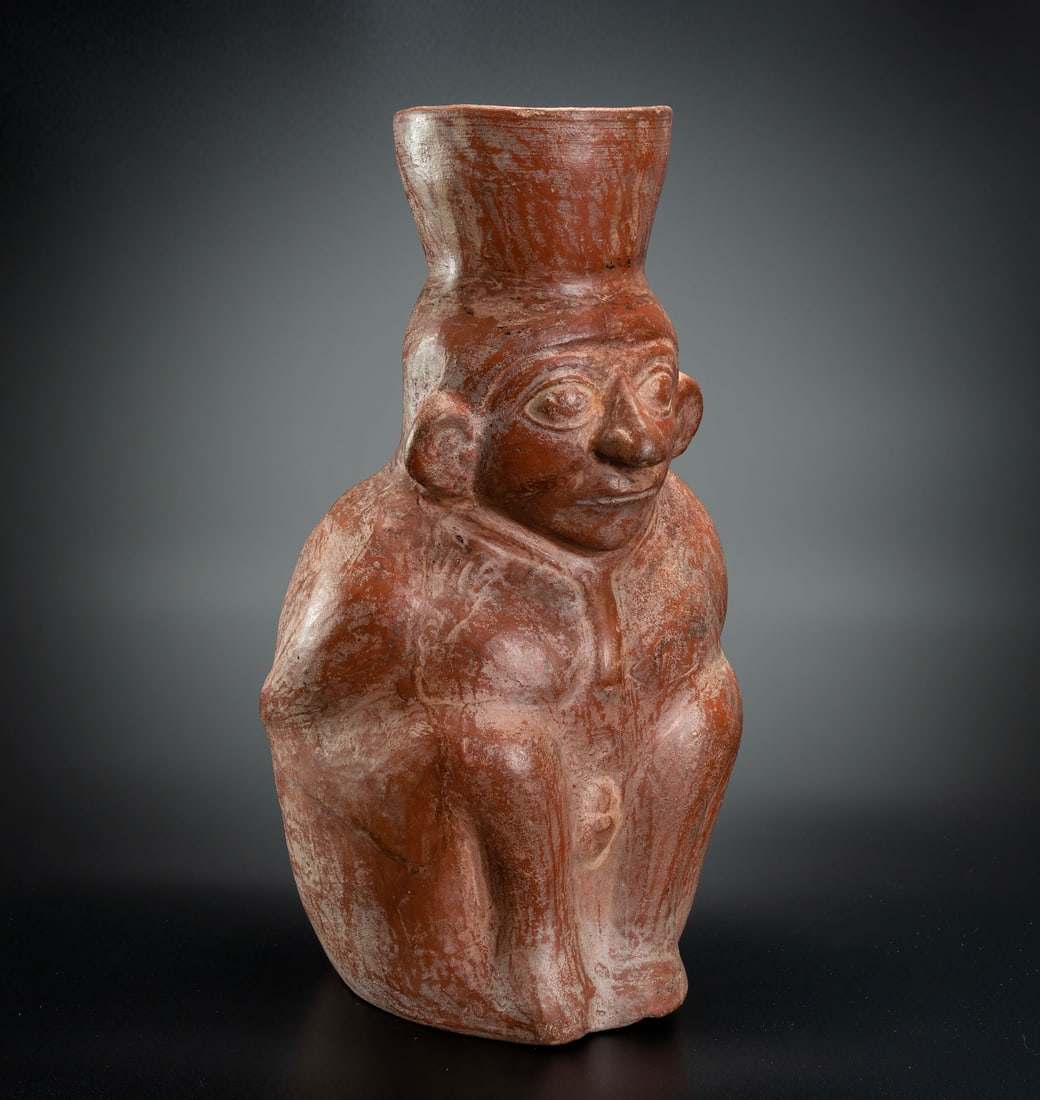 An Effigy Jar: Prisoner, Moche, Peru, 200-500 CE: An Effigy Jar: Prisoner, Moche, Peru, 200-500 CE Height: 29 cm Provenance: Kemper Collection, Switzerland. Donated to "The Museum of Islamic Art", Jerusalem, during 1970's. Purchased