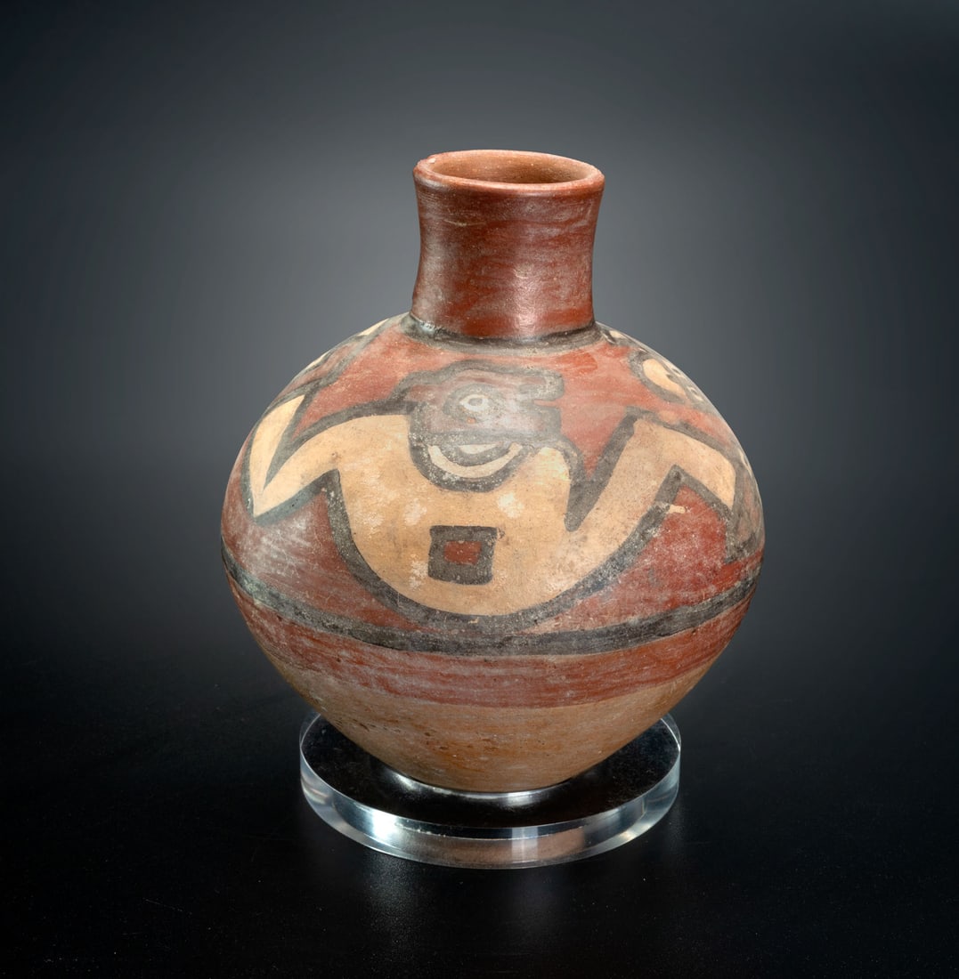 A Spouted Jar with Feline Motifs, Huari, Peru, 800-1000 CE: A Spouted Jar with Feline Motifs, Huari, Peru, 800-1000 CE Height: 16.5 cm Provenance: Kemper Collection, Switzerland. Donated to "The Museum of Islamic Art", Jerusalem, during 1970's. <