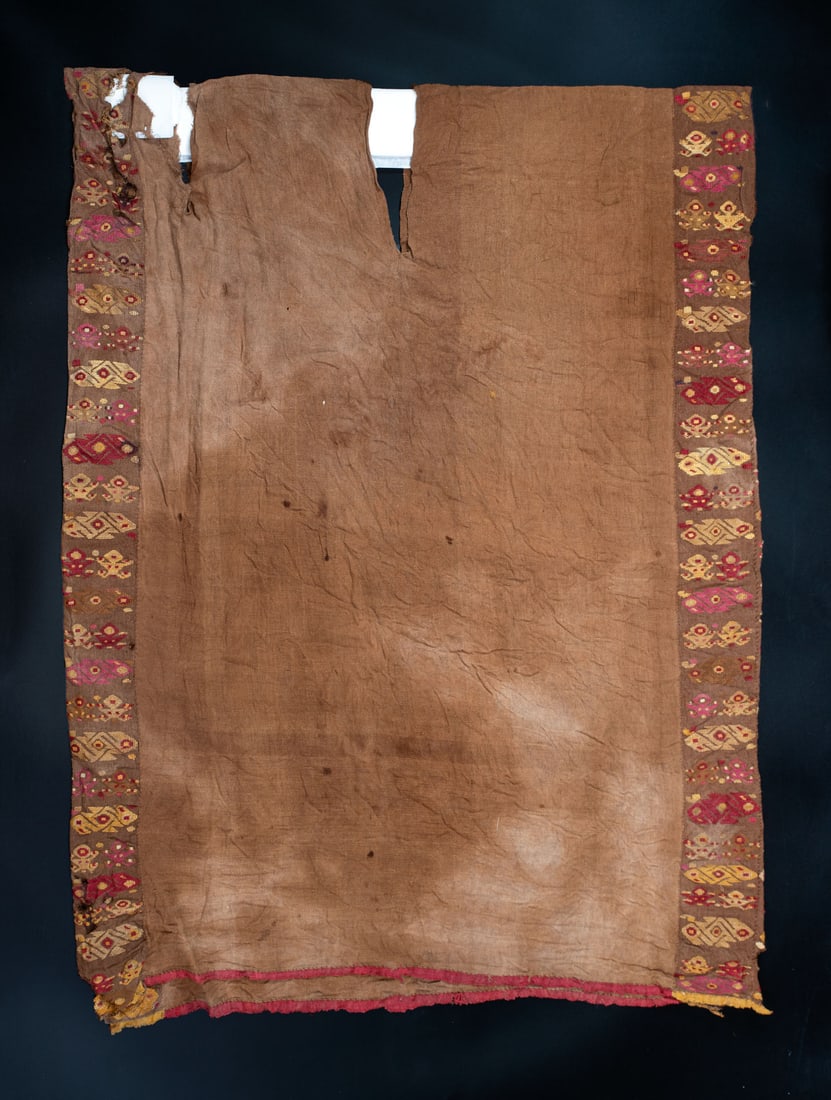 A Shirt with Bird and Frog Motifs, South Coast, Peru, Late Horizon, 1450-1550 CE: A Shirt with Bird and Frog Motifs, South Coast, Peru, Late Horizon, 1450-1550 CE Nasca-Inca Brown cotton and multicolored camelid fiber. The principle panel plain weave warp face with supplementary we