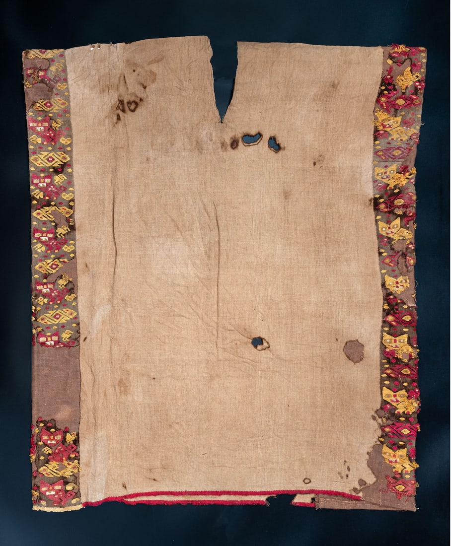 A Complete Shirt with Bird and Feline Motifs, South Coast, Peru, Late Horizon, 1450-1550 CE: A Complete Shirt with Bird and Feline Motifs, South Coast, Peru, Late Horizon, 1450-1550 CE Nasca-Inca Cotton and multicolored camelid fiber. The central panel, plain weave warp face with supplementar