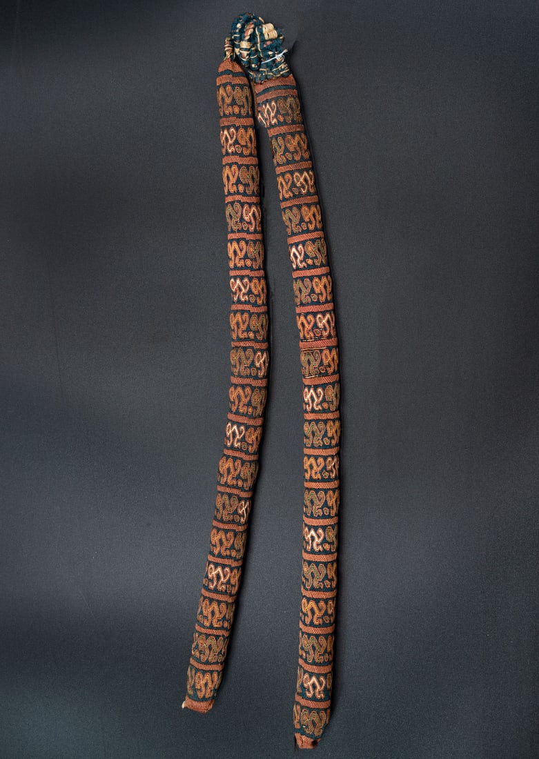 A Whip (?), Inca or Colonial, 1500-1600 CE: A Whip (?), Inca or Colonial, 1500-1600 CE Length: 45 cm Provenance: "Haifa Museum of Art" (according to the literature) Acquired by the Maiman Group following a 1988 exhibition and the clos
