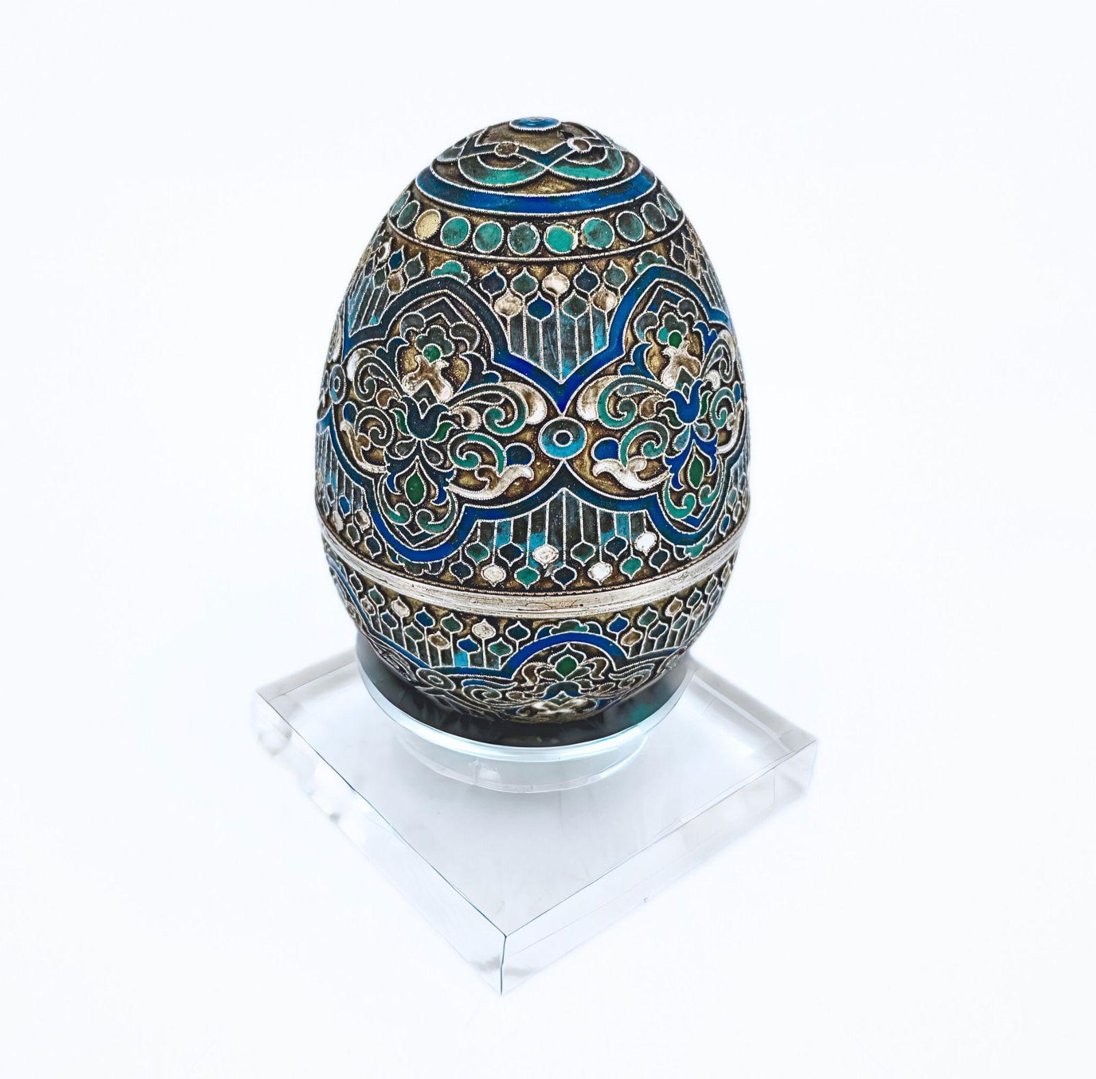 Decorative Egg, Made of Silver and Cloisonné Enamel, Russia, Late 19th Century Early 20th Centu: Filigree Work (Filigree), Combined with Cloisonné Enamel. The egg is adorned with geometric shapes, combined with clusters of flowers in shades of blue, turquoise, green, red, and white.