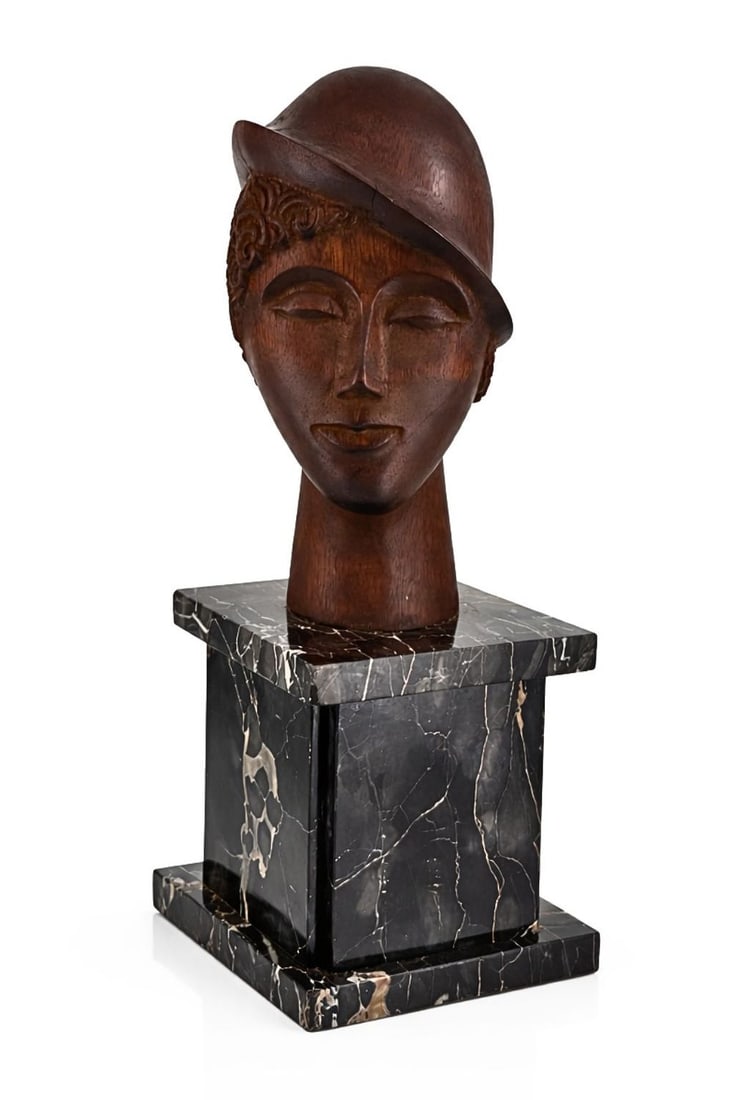 Elie Nadelman (1882-1946), Art Deco Female Head: Carved wood Base: Marble pedestal Signature at the lower edge Height (including the marble base): 64 cm Width: 18 cm