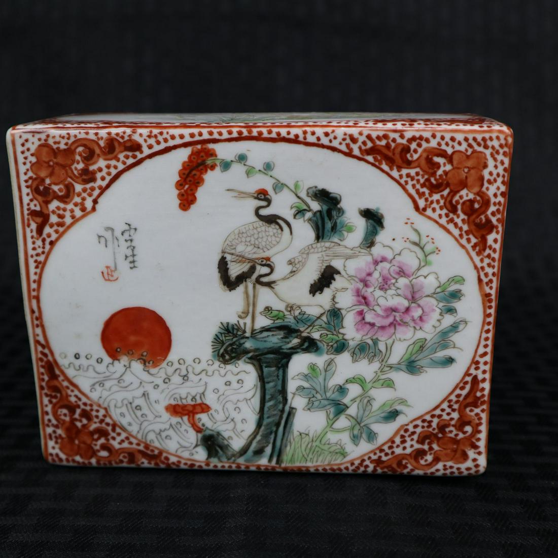 A famille rose porcelain pillow: A Chinese famille rose porcalin pillow L: 5.5" x H: 2.3"