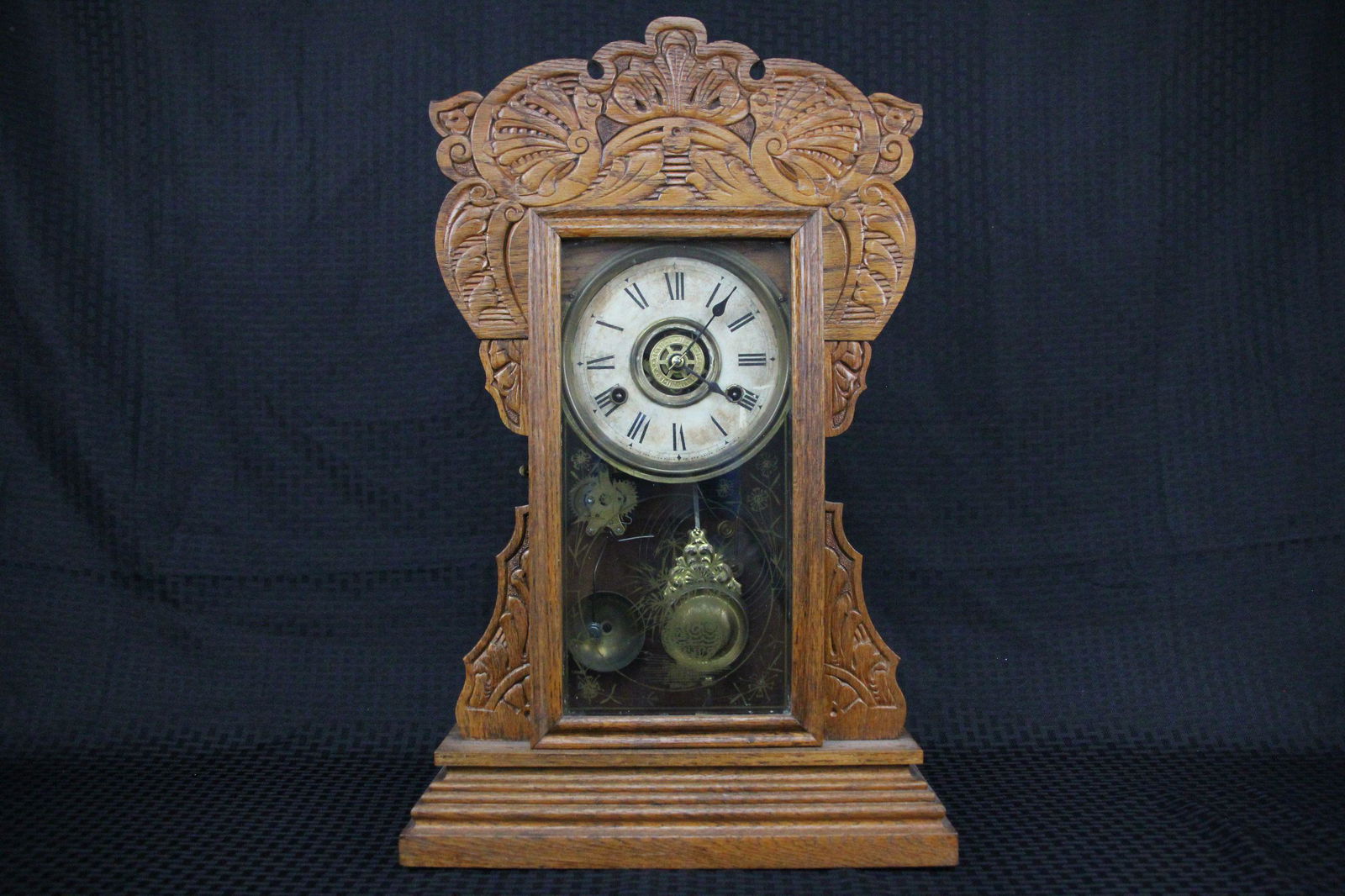 A vintage wooden carved pendulum table clock (1 of 6)