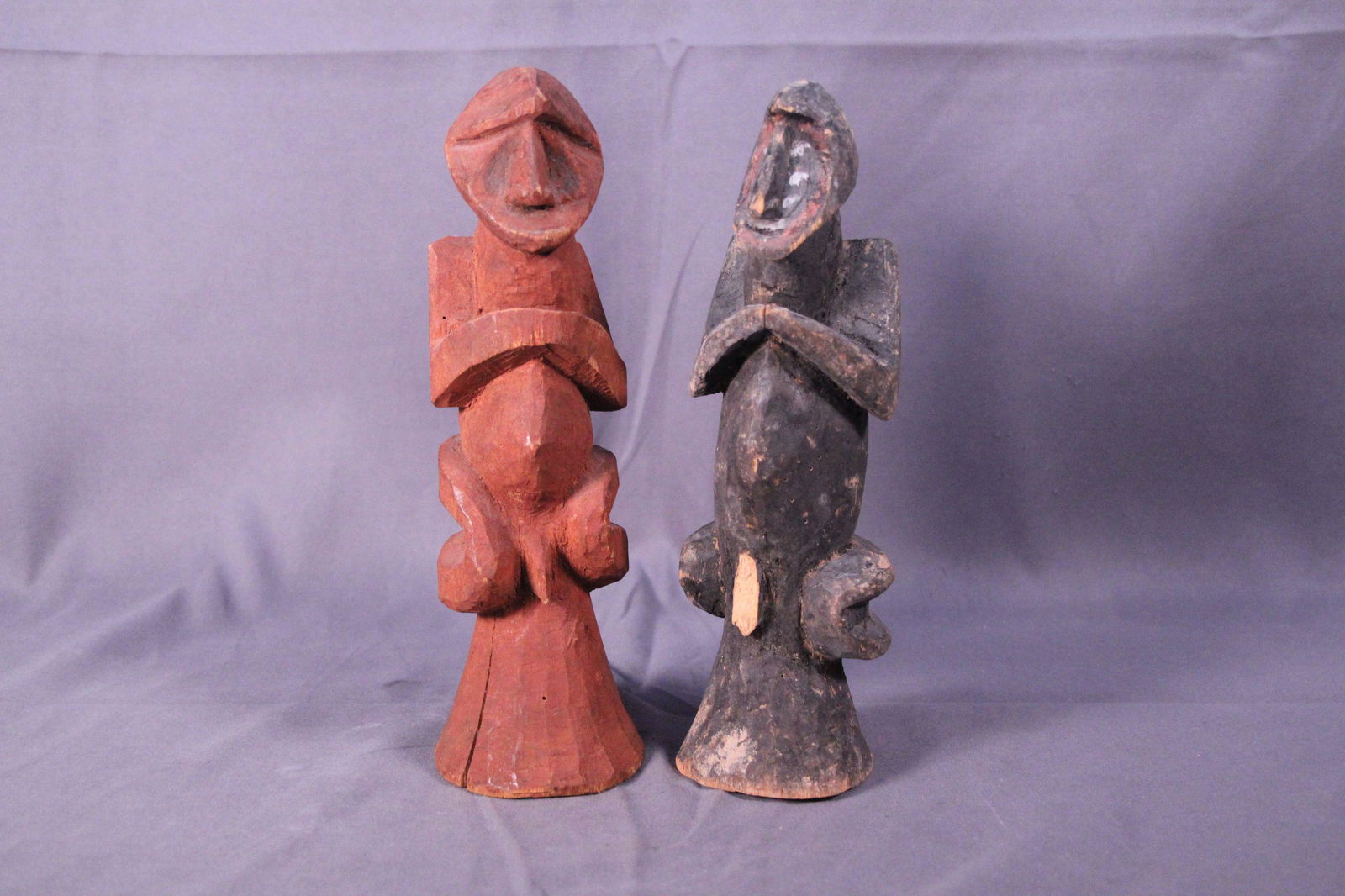 A pair of wooden carved men (1 of 6)