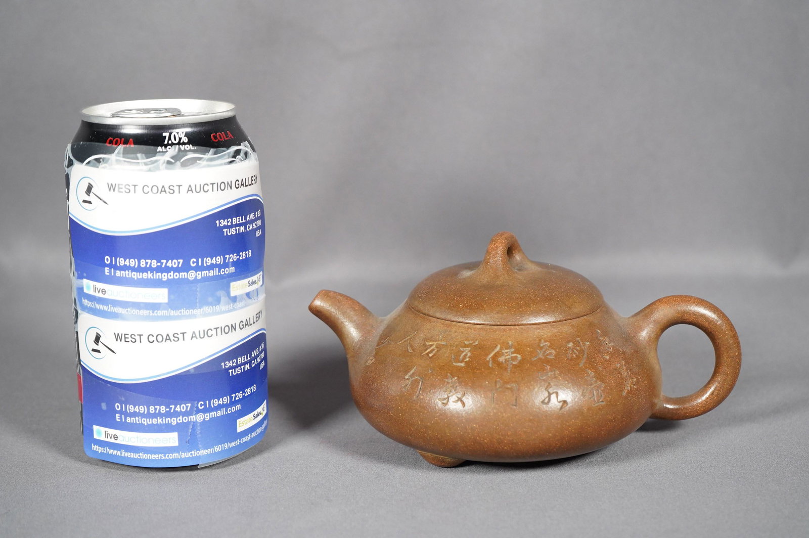 Chinese vintage clay teapot: Chinese clay teapot with Chinese calligraphy carving. W: 6" x H: 3"