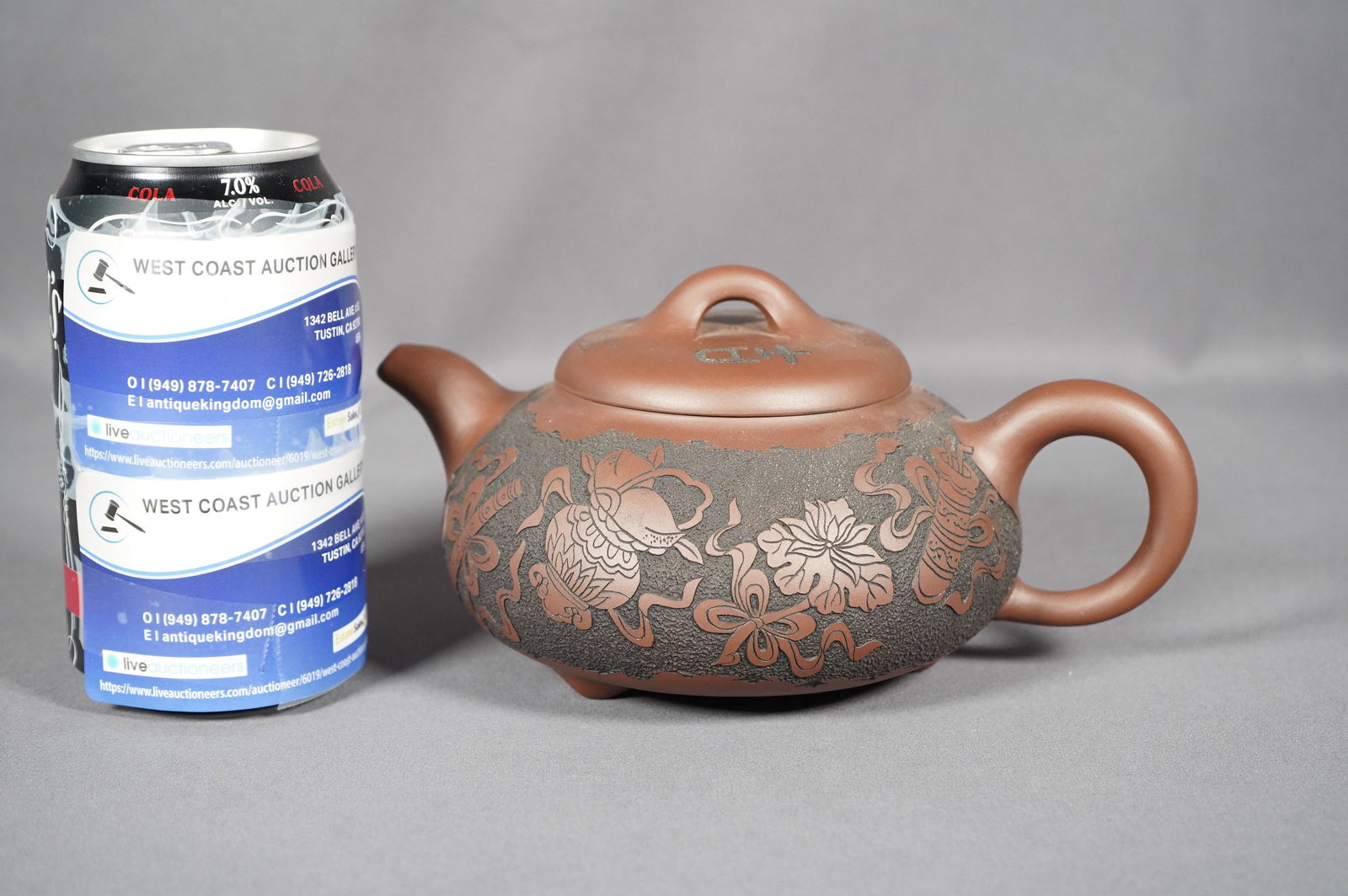 Chinese carved clay teapot: Chinese carved clay teapot, W: 7" x H: 4"