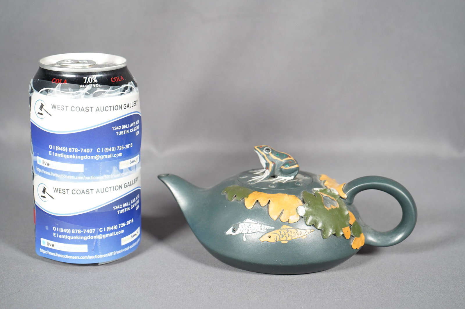 Chinese greenish clay teapot: Chinese greenish clay teapot, with frog on top. W: 6" x H: 3"
