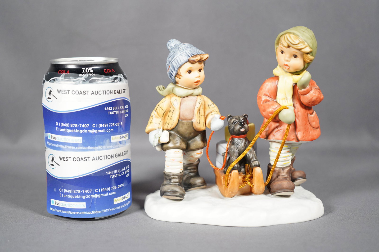 A Goebel Hummel figurine: A Goebel Hummel porcelian figurine BH 60, dated 1998. H: 6" x W: 5.5"