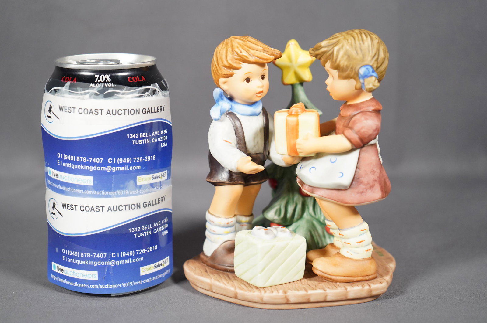 A Goebel Hummel figurine: A Goebel Hummel porcelain figurine BH 69, dated 1999. H: 6" x W: 4.5"