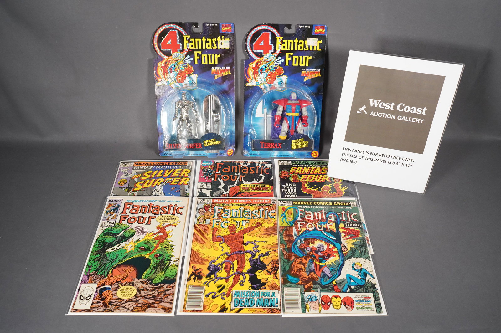 Lots of comic and toys: Lots of vintage Fantastic Four comics and vintage action figures.