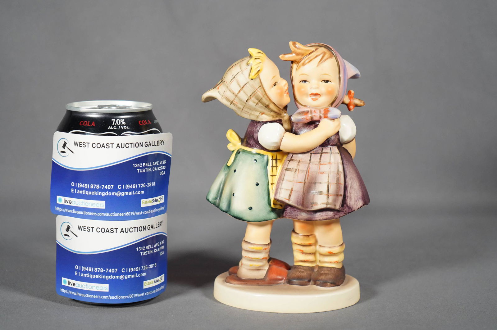 Humme porcelain figure: A vintage Goebel Hummel, Germany little girls standing figure. H: 6.5 x W: 4"