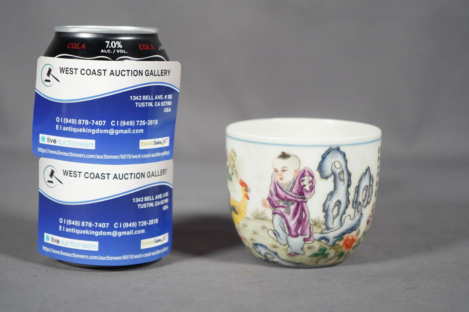 Chinese tea cup: Chinese vintage tea cup, with types of writing on the back. H: 3" x W: 2.75"