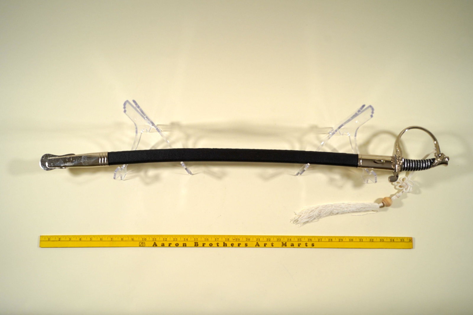 A replica sword: A replica sword of United States Marine, used for movie prop. L: 38.25" x W: 5.75"