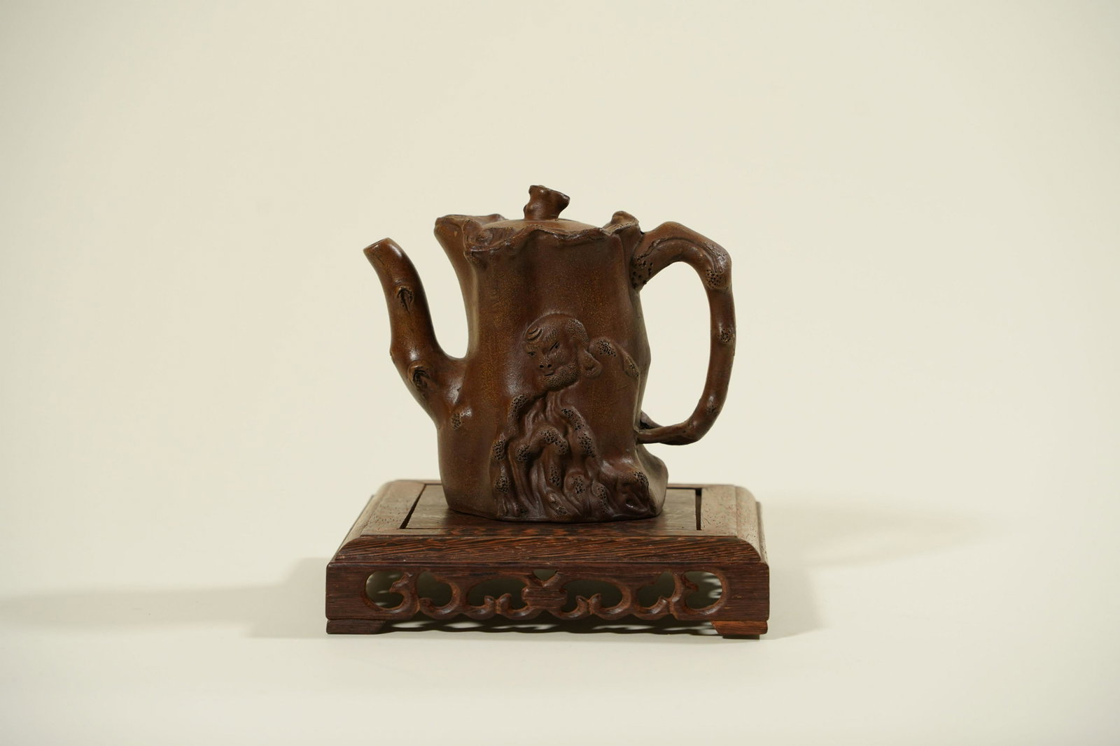 Chinese clay teapot: Chinese clay teapot, in a form of a tree branch. Maker's mark at the bottom. H: 6" x W: 5.5"