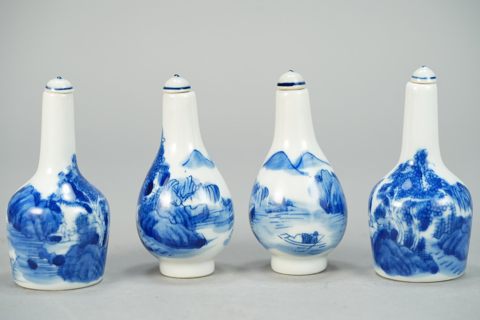 4 pcs Chinese snuff bottles: 4 pcs Chinese porcelian snuff bottles. Largest h: 3.75" x W: 1.75"