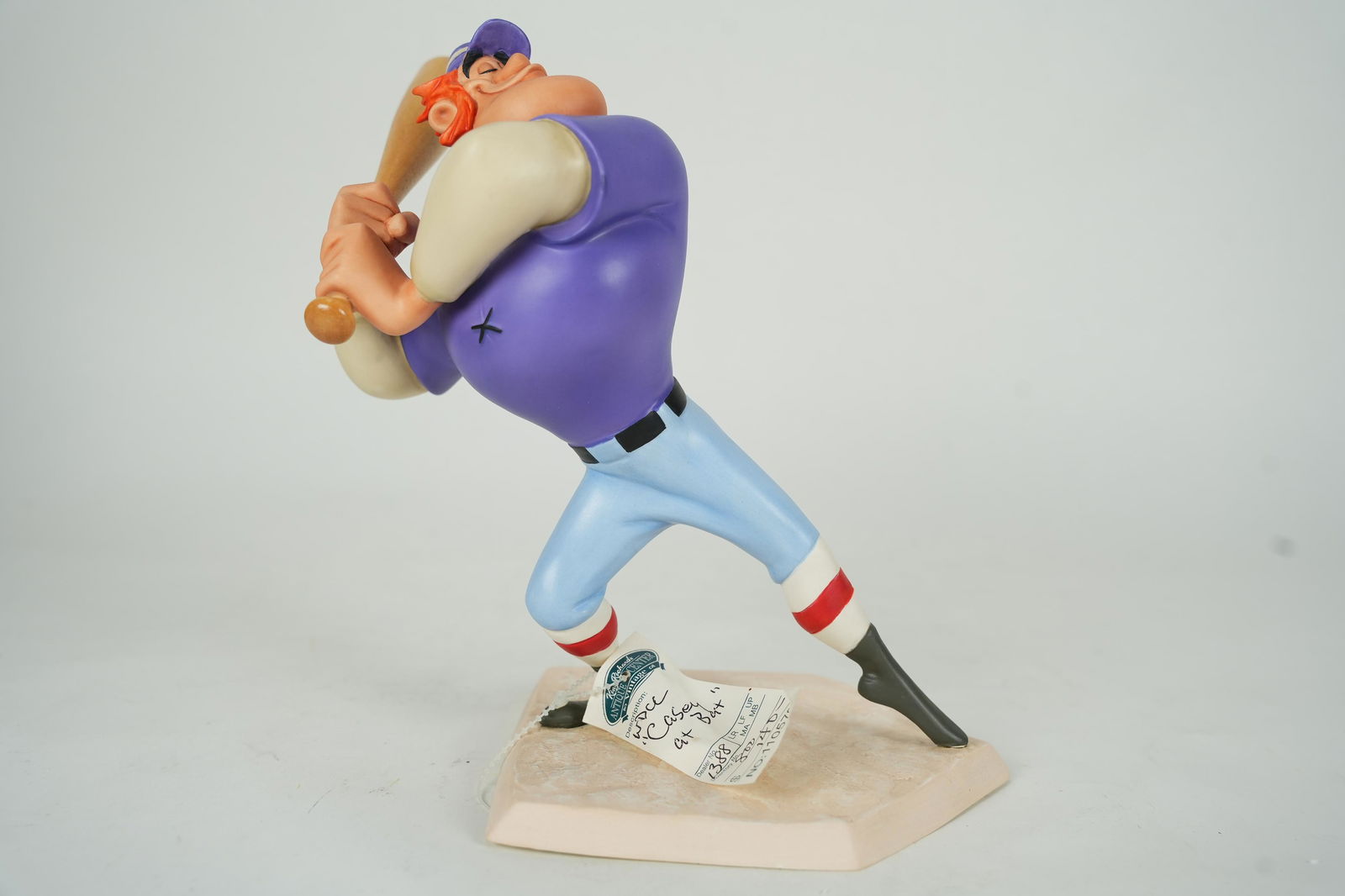 A Disney WDC baseball figurine (1 of 6)