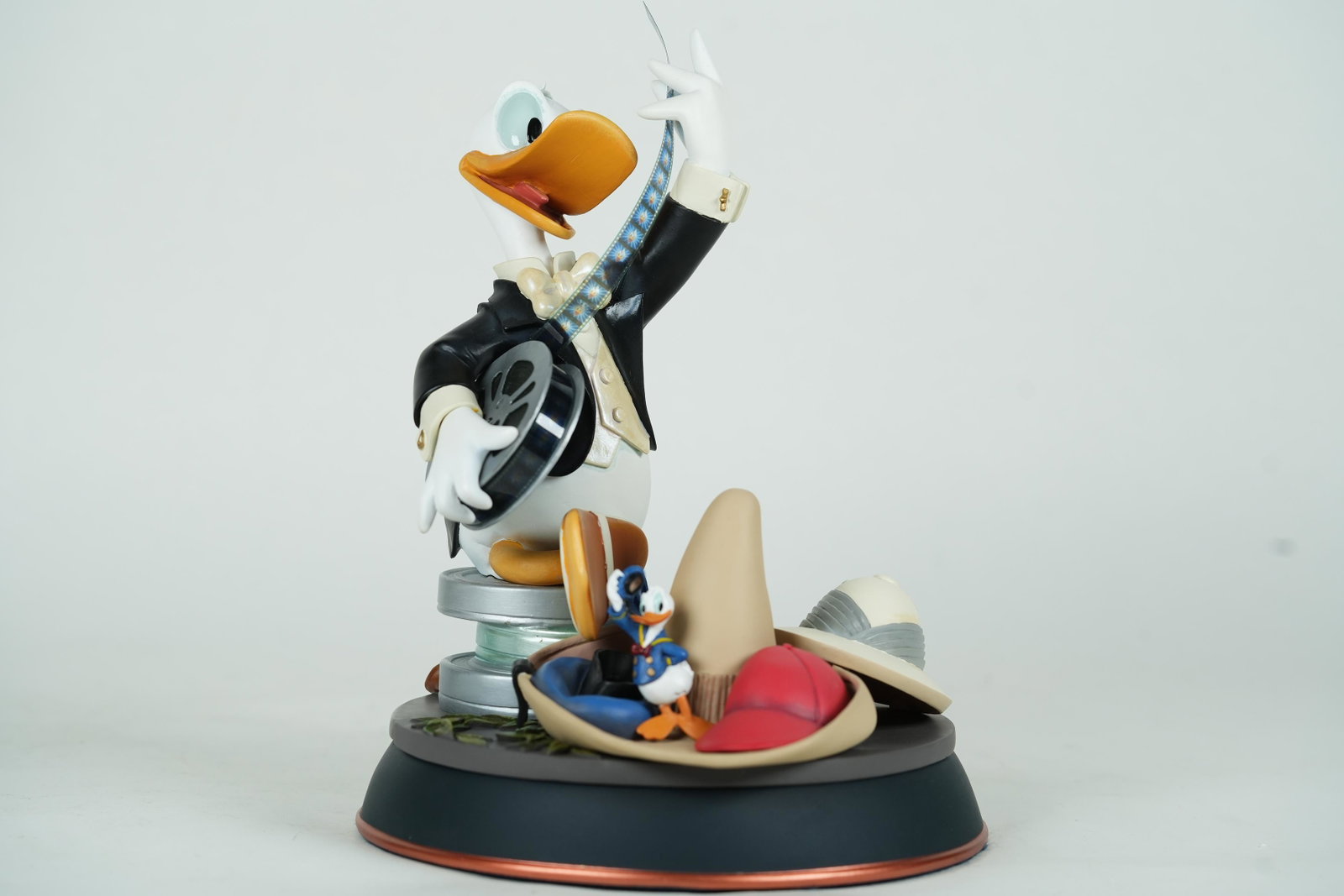 A Donald Duck Disney figurine: A very limited Donald Duck Disney figurine, with original box. H: 10.5" x W: 7.4."