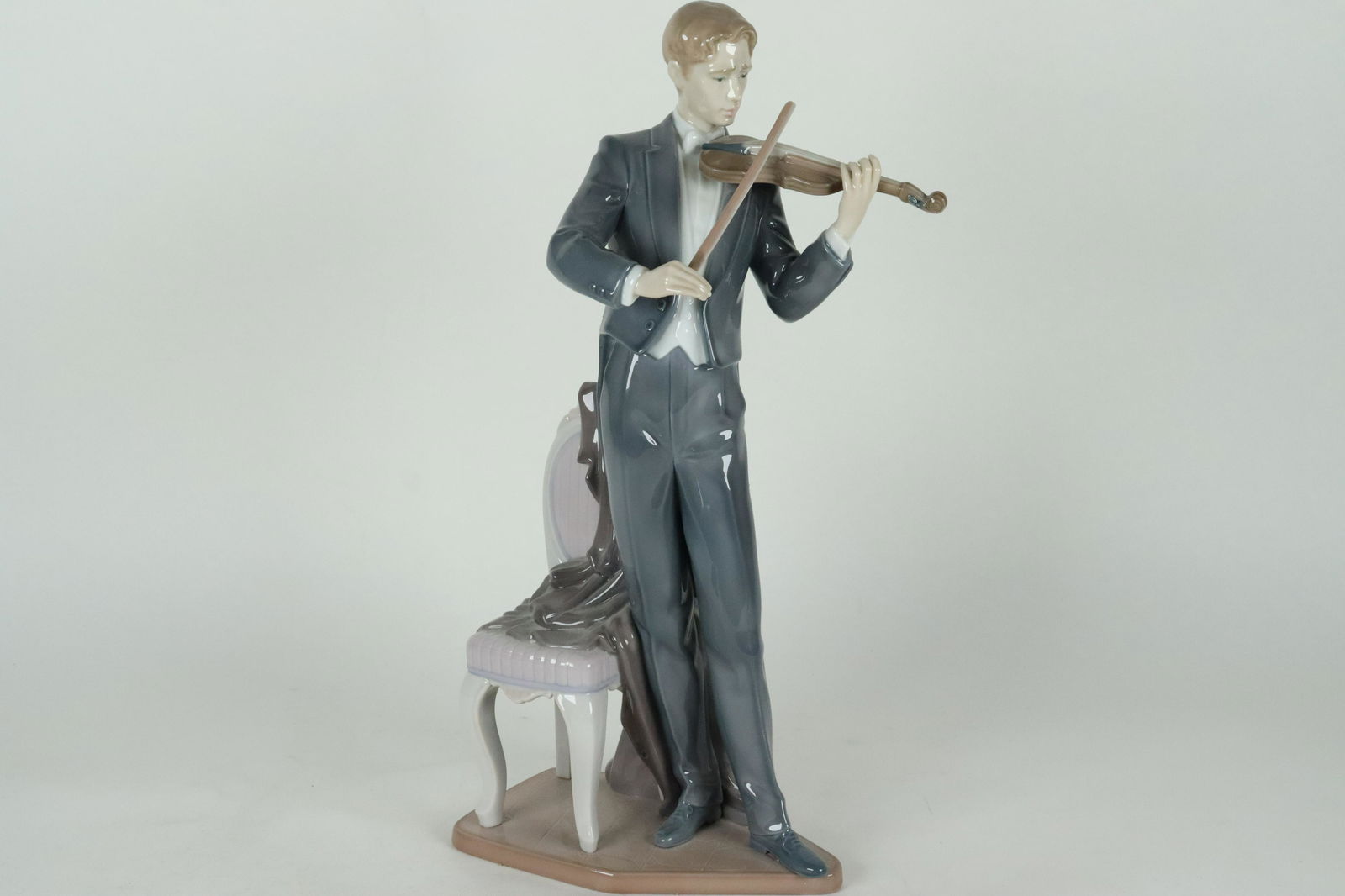 A Lladro violinist figurine (1 of 6)
